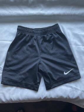 Nike Boys Black Athletic Mesh Shorts with White Swoosh